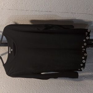 Black sweater with asymmetric jeweled bottom